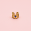 Anillo filigrana azul - fondo rosa