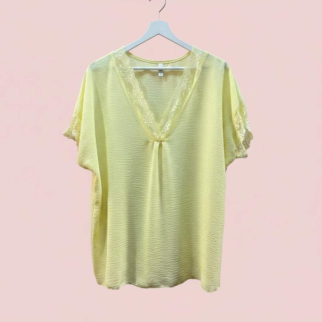 Blusa amarilla percha blanca