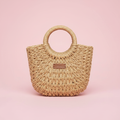 Bolso mimbre natural fondo rosa