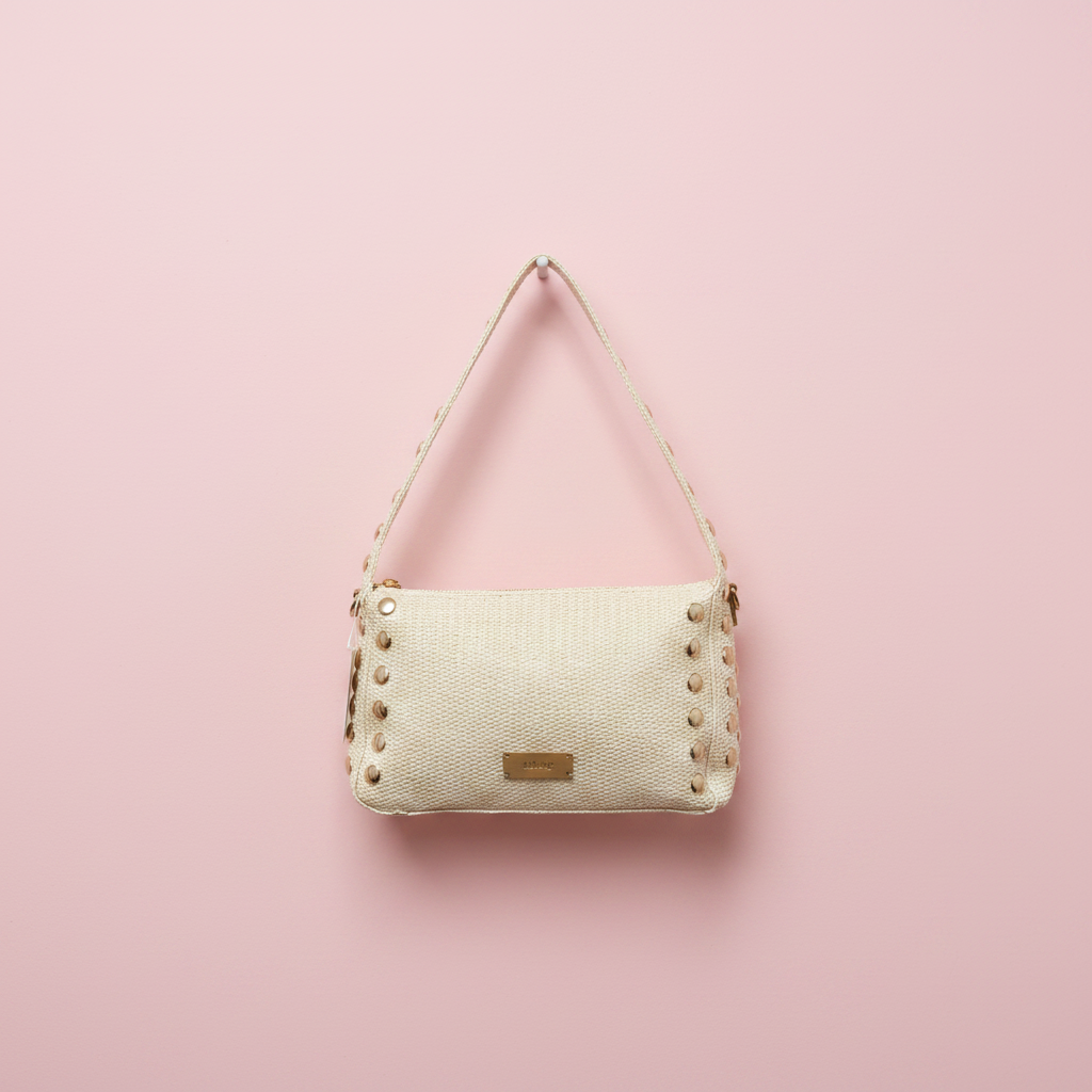 Bolso raffia crema studs fondo rosa