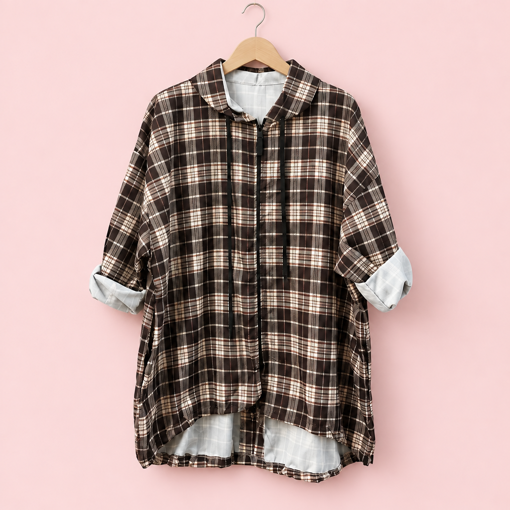 Camisa de cuadros sobre fondo rosa