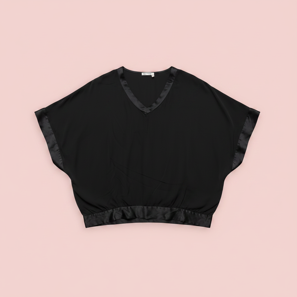 Producto negro fondo rosa