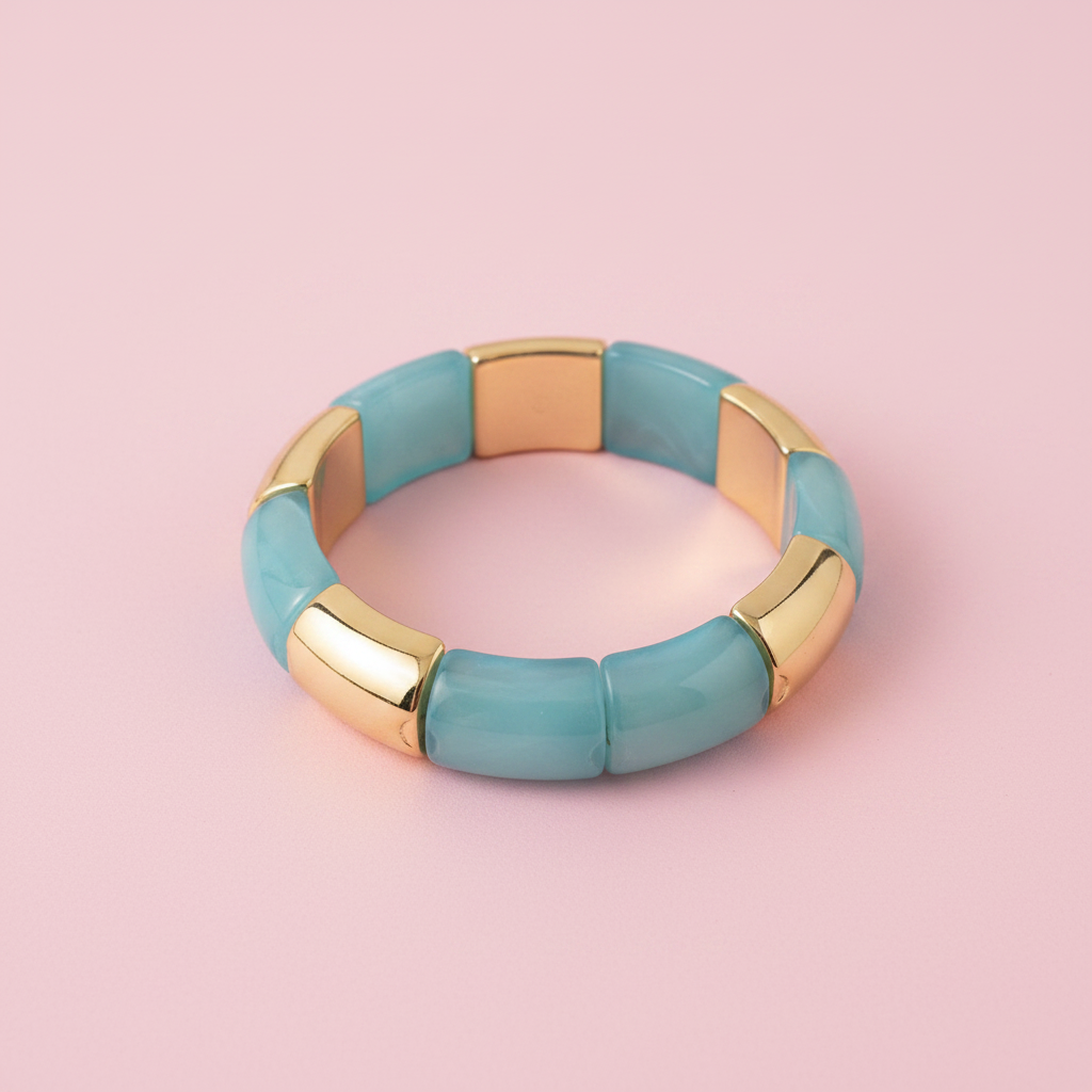Pulsera bisutería celeste dorada