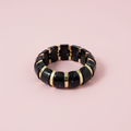 Pulsera negro dorada