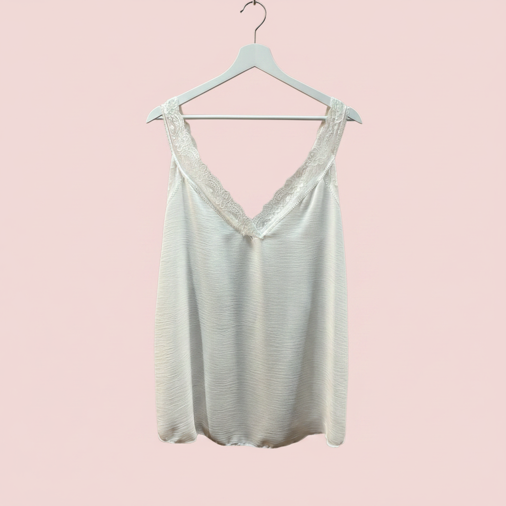 Top Élite blanco percha blanca